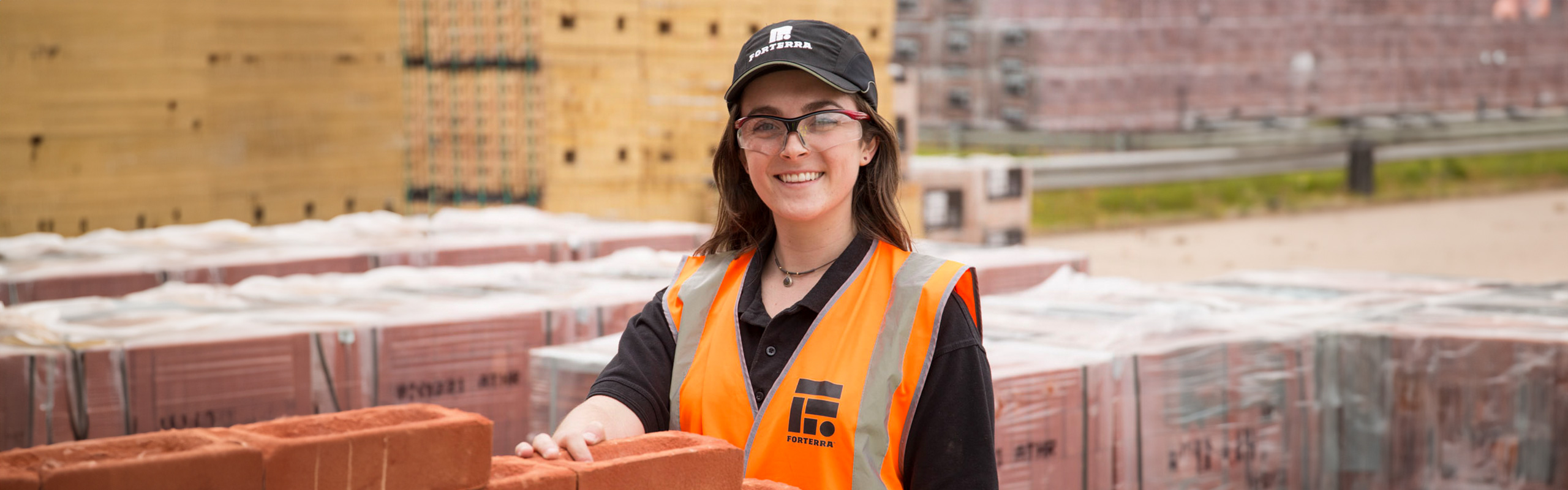 Young woman working in building materials