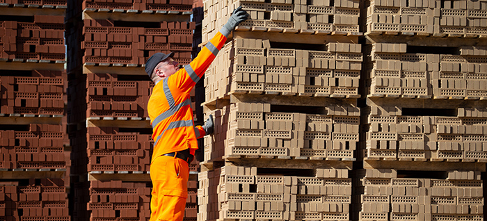 Man in building materials warehouse