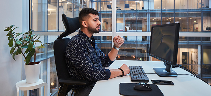 Finance manager at desk