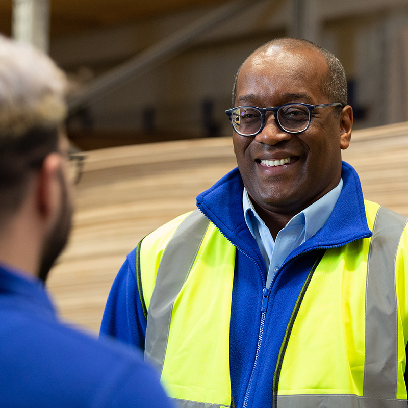 Two men in warehouse