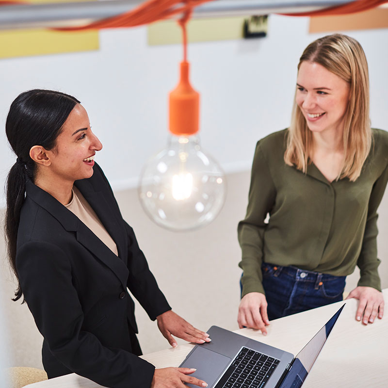 Two women at laptop
